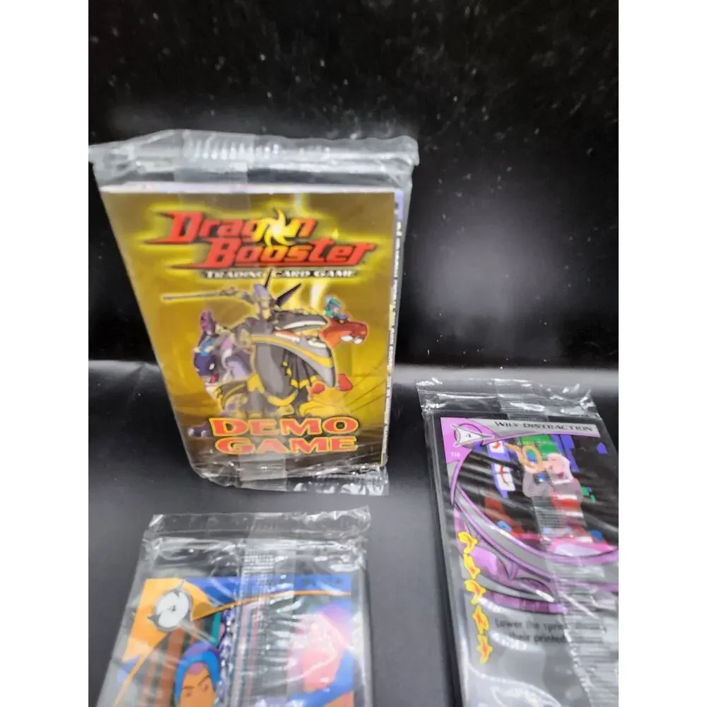 DRAGON BOOSTER TRADING CARD GAME DEMO GAME SEALED PACK NM CARDS. 4 Packs
